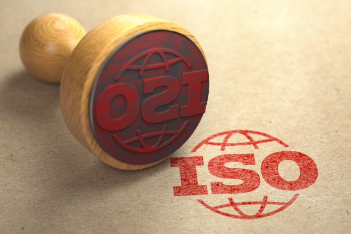 ISO 9001 certified concept. Rubber stamp with the text ISO 9001
